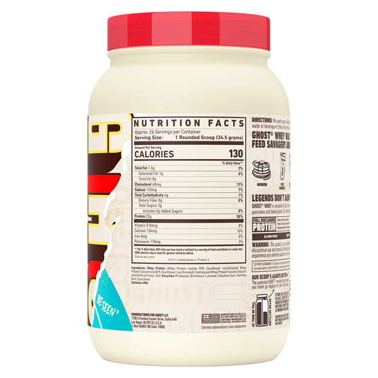 Back view of a large white tub of GHOST+ Whey Protein Isolate powder with a red lid, showing the nutrition facts and directions label.