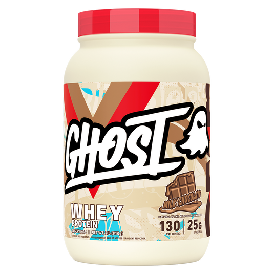 A tub of Ghost Whey Protein in Milk Chocolate flavor, featuring a cream-colored container, a red lid, and a label with a large stylized 'GHOST' logo and chocolate graphics.